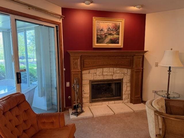 803 Persimmon Ln Unit A, Mount Prospect, IL 60056 - sitting room featuring carpet and a stone fireplace