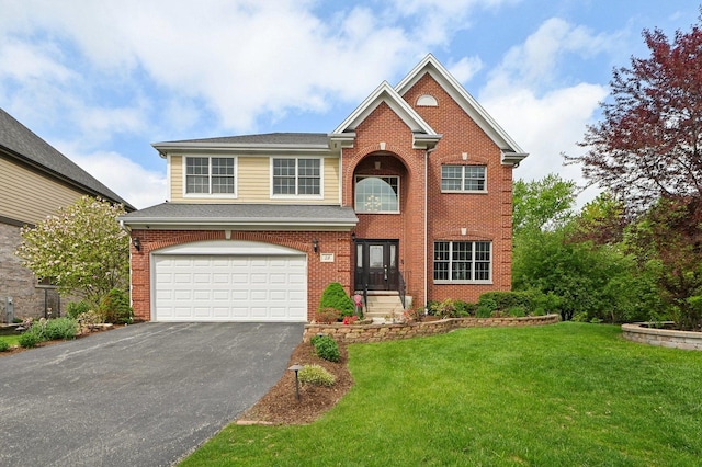 28 W Summerset Ct, Palatine, IL 60067 - traditional-style home with asphalt driveway, an attached garage, a front yard, and brick siding