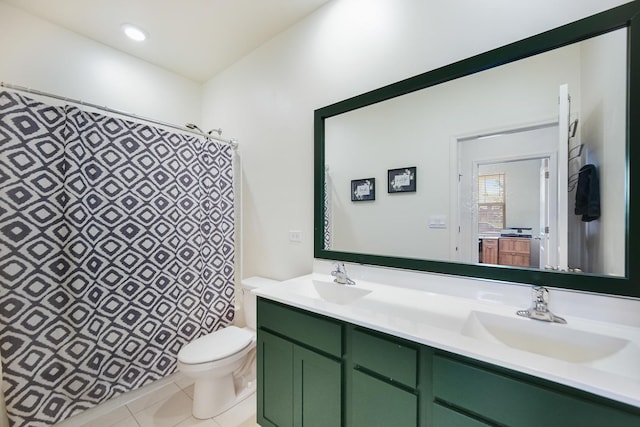 full bathroom featuring toilet, double vanity, a shower with curtain, and tile patterned flooring