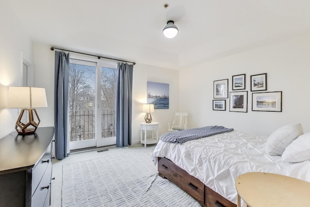 19 W 15th St, Chicago, IL 60605 - bedroom with light colored carpet, access to exterior, and baseboards