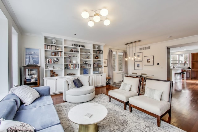 19 W 15th St, Chicago, IL 60605 - living room featuring dark wood-style floors, crown molding, and a chandelier