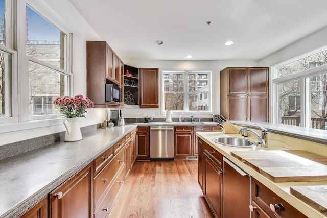 19 W 15th St, Chicago, IL 60605 - kitchen with stainless steel dishwasher, black microwave, a sink, light wood-style flooring, and recessed lighting
