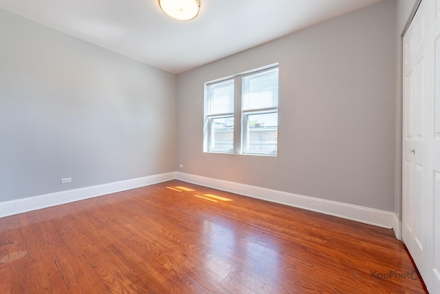 4006 W Nelson St Unit 6A, Chicago, IL 60641 - unfurnished room featuring wood finished floors and baseboards