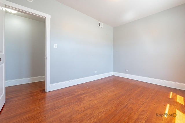 4006 W Nelson St Unit 6A, Chicago, IL 60641 - empty room featuring wood finished floors and baseboards