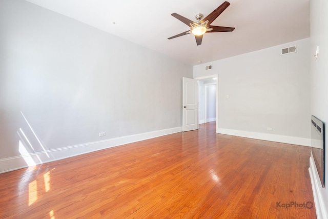 4006 W Nelson St Unit 6A, Chicago, IL 60641 - spare room with a ceiling fan, light wood-type flooring, and baseboards