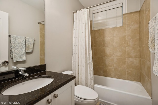 full bathroom featuring toilet, shower / bathtub combination with curtain, and vanity