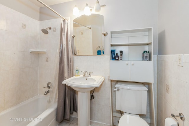 1313B S Rebecca Rd Unit 215, Lombard, IL 60148 - bathroom with tile walls, toilet, shower / bath combo with shower curtain, and a sink