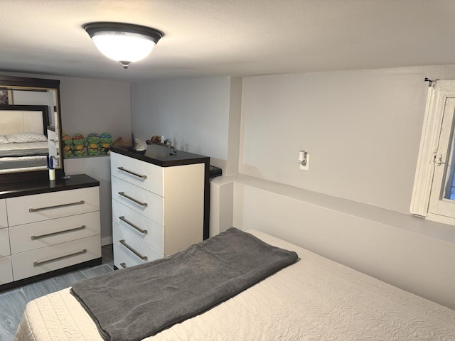5343 W Warwick Ave, Chicago, IL 60641 - bedroom with dark wood-style flooring