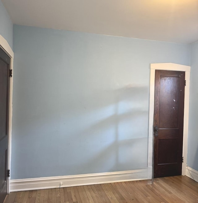 5343 W Warwick Ave, Chicago, IL 60641 - spare room featuring wood finished floors and baseboards
