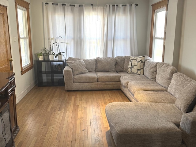 5343 W Warwick Ave, Chicago, IL 60641 - living room with light wood finished floors and baseboards