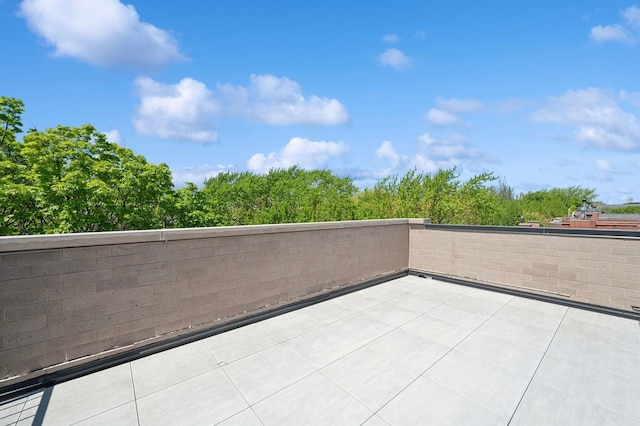 view of patio / terrace featuring fence