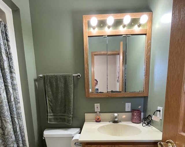 80 N 14th Rd, Lostant, IL 61334 - bathroom featuring toilet and vanity