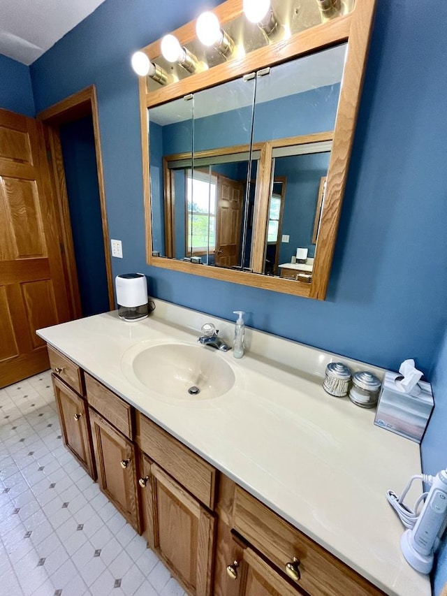 80 N 14th Rd, Lostant, IL 61334 - bathroom with tile patterned floors and vanity