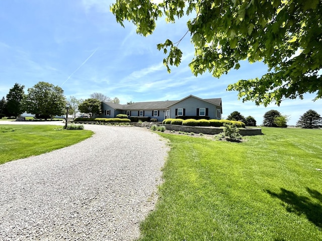 80 N 14th Rd, Lostant, IL 61334 - single story home with a front lawn