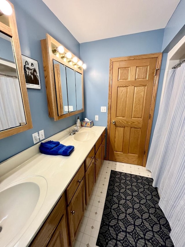 80 N 14th Rd, Lostant, IL 61334 - bathroom with double vanity and tile patterned floors