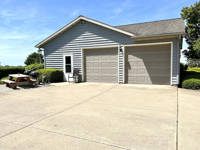 80 N 14th Rd, Lostant, IL 61334 - view of side of property with driveway and a shingled roof