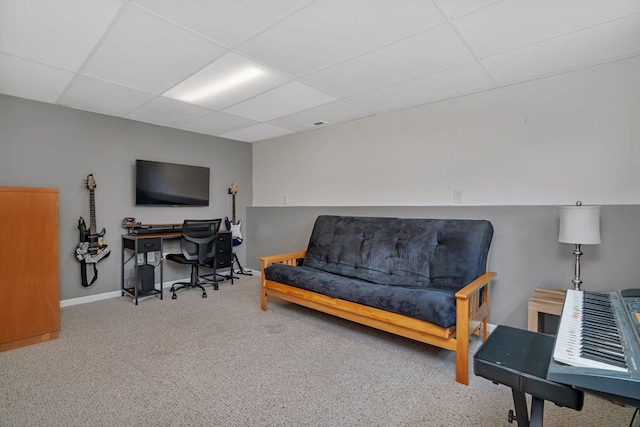 424 Falcon Ridge Way, Bolingbrook, IL 60440 - carpeted living area featuring a paneled ceiling, a desk, and baseboards