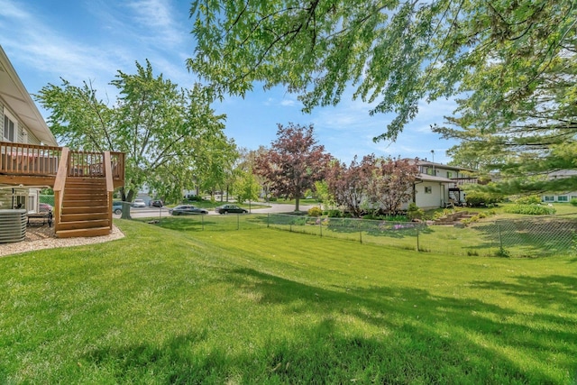 424 Falcon Ridge Way, Bolingbrook, IL 60440 - view of yard with stairway, a deck, and cooling unit
