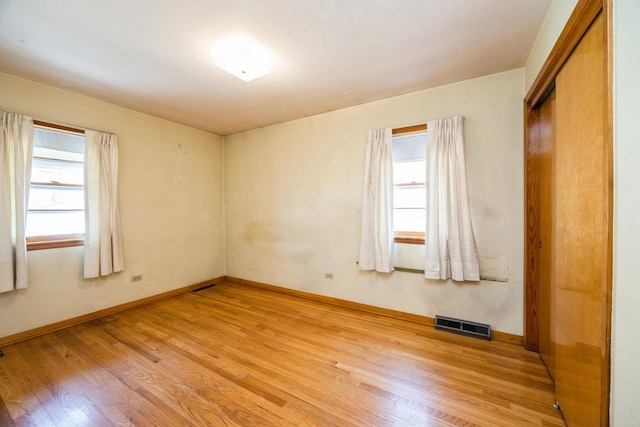 3714 S 58th Ave, Cicero, IL 60804 - spare room with light wood-style floors and baseboards