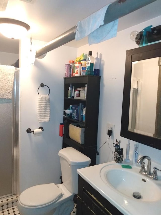8015 S May St, Chicago, IL 60620 - full bathroom with a stall shower, toilet, and vanity