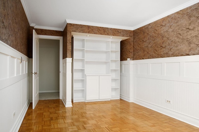 2700 E Bel Aire Dr Unit 304, Arlington Heights, IL 60004 - unfurnished bedroom featuring a decorative wall, wainscoting, wallpapered walls, ornamental molding, and baseboards