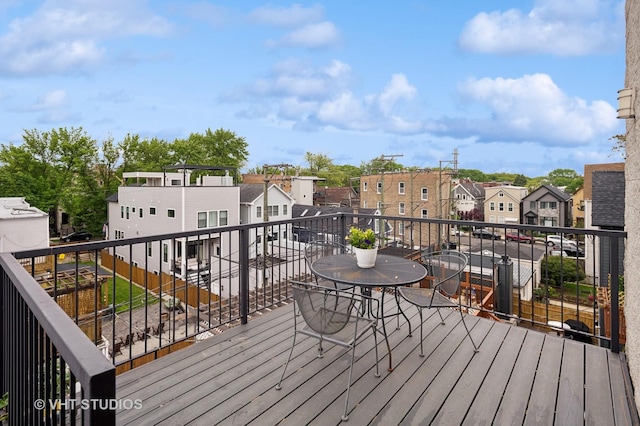 2116 W Barry Ave Unit 3, Chicago, IL 60618 - wooden deck featuring a residential view