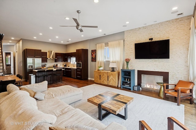 2116 W Barry Ave Unit 3, Chicago, IL 60618 - living room with ceiling fan, wood finished floors, recessed lighting, a fireplace, and baseboards