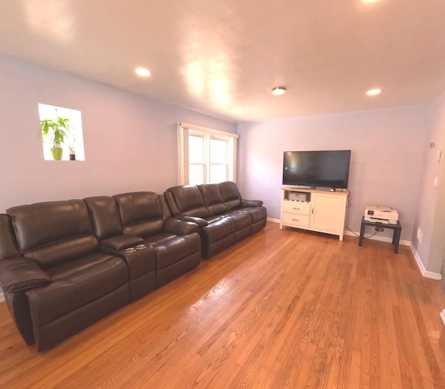 6209 N Nagle Ave, Chicago, IL 60646 - living area featuring light wood finished floors, recessed lighting, and baseboards
