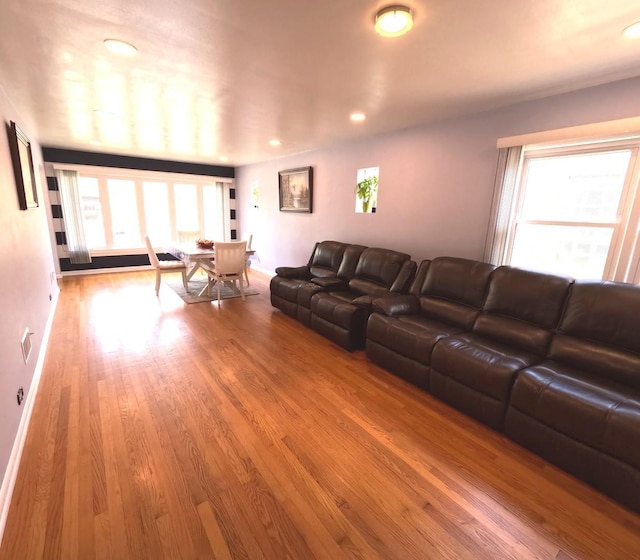 6209 N Nagle Ave, Chicago, IL 60646 - living area with plenty of natural light, wood finished floors, and recessed lighting