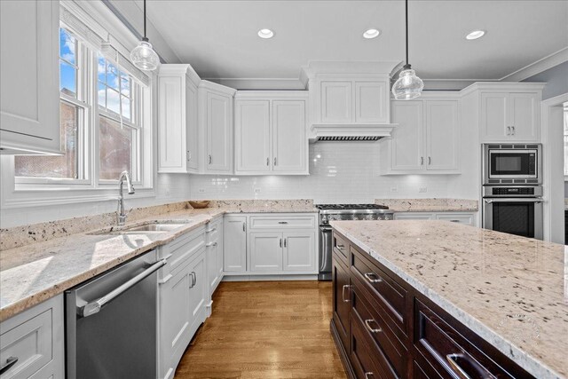 5233 Carpenter St, Downers Grove, IL 60515 - kitchen with appliances with stainless steel finishes, a sink, white cabinets, dark brown cabinetry, and recessed lighting