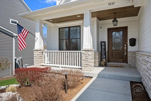 5233 Carpenter St, Downers Grove, IL 60515 - property entrance featuring a porch and stone siding