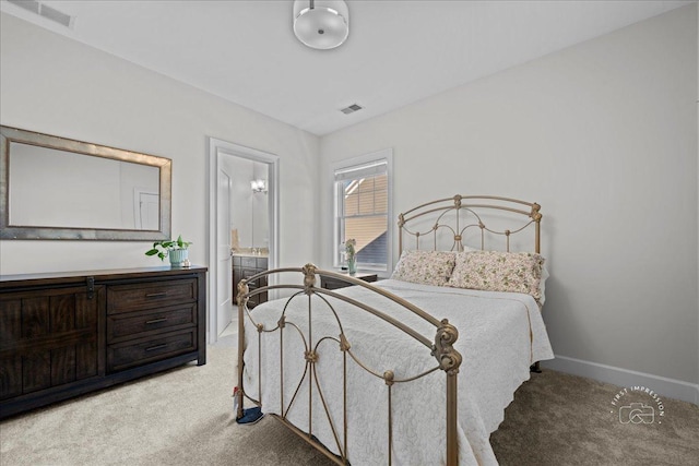 5233 Carpenter St, Downers Grove, IL 60515 - bedroom with light colored carpet, baseboards, and ensuite bathroom