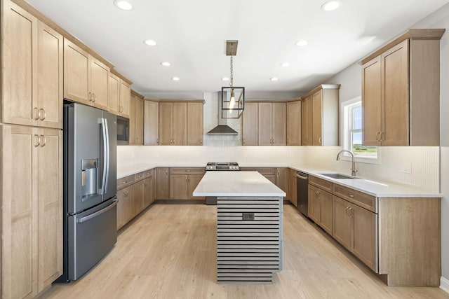 kitchen with stainless steel appliances, a sink, light brown cabinets, recessed lighting, and light countertops