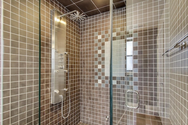 bathroom with a stall shower