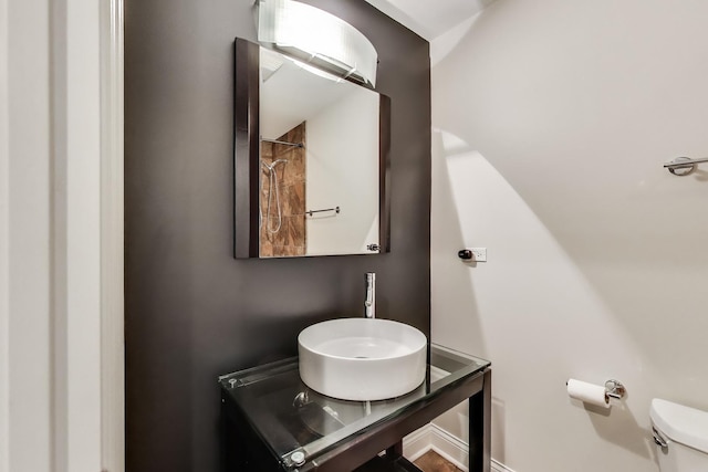bathroom featuring a sink and toilet