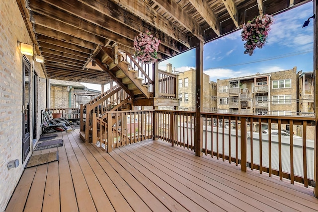 wooden terrace featuring stairway