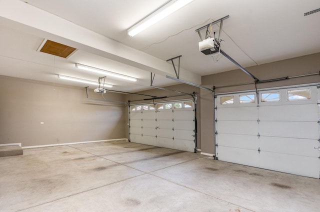 1073 Hawthorne Ave, Beecher, IL 60401 - garage featuring a garage door opener and baseboards