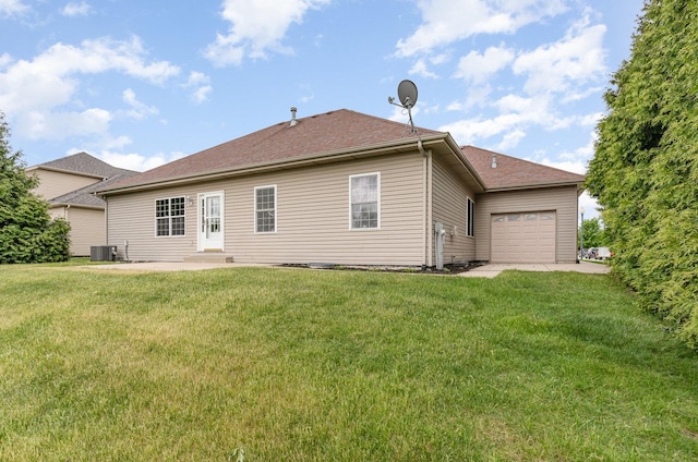 1073 Hawthorne Ave, Beecher, IL 60401 - rear view of house featuring central air condition unit, a garage, and a yard