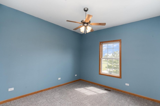 1073 Hawthorne Ave, Beecher, IL 60401 - carpeted empty room featuring baseboards and ceiling fan