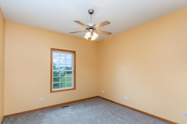 1073 Hawthorne Ave, Beecher, IL 60401 - carpeted spare room with baseboards and ceiling fan