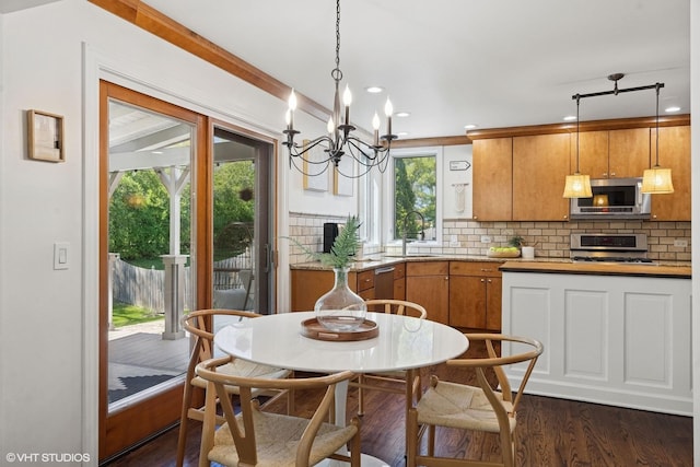 2116 Nachtman Ct, Wheaton, IL 60187 - kitchen with appliances with stainless steel finishes, a sink, light countertops, decorative backsplash, and dark wood-type flooring