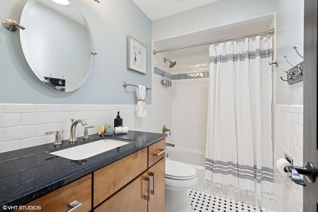 2116 Nachtman Ct, Wheaton, IL 60187 - bathroom featuring tile walls, toilet, vanity, shower / bath combo, and tile patterned flooring