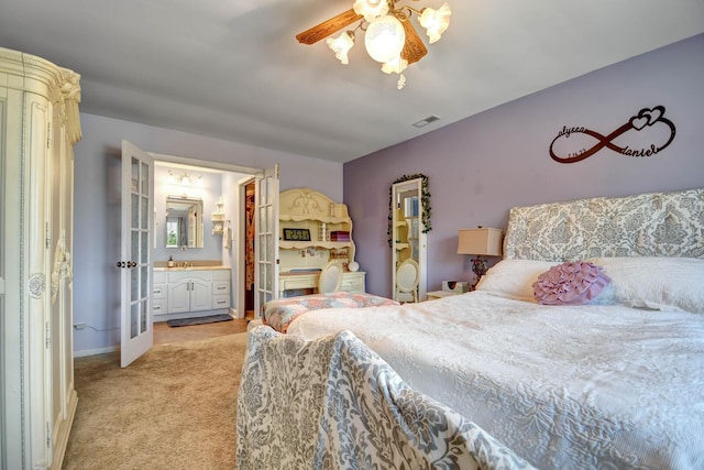13228 S Westview Dr Unit 2A, Palos Heights, IL 60463 - bedroom with light colored carpet, baseboards, ensuite bath, and ceiling fan