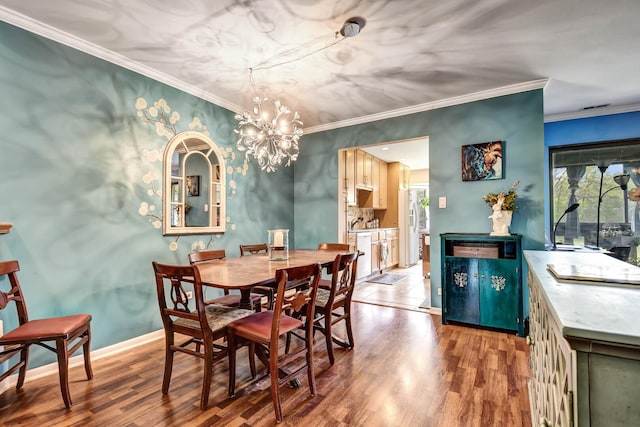 13228 S Westview Dr Unit 2A, Palos Heights, IL 60463 - dining space with plenty of natural light, wood finished floors, a chandelier, ornamental molding, and baseboards