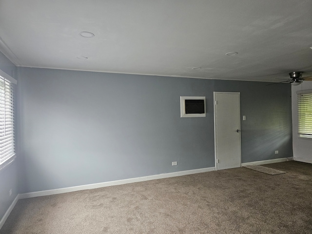 216 Washington St, Park Forest, IL 60466 - carpeted spare room with ceiling fan and baseboards