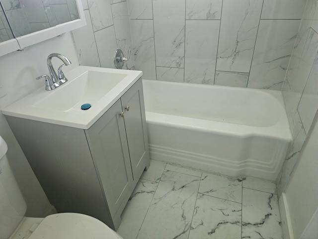 216 Washington St, Park Forest, IL 60466 - full bath featuring marble finish flooring, toilet, a tub to relax in, and vanity