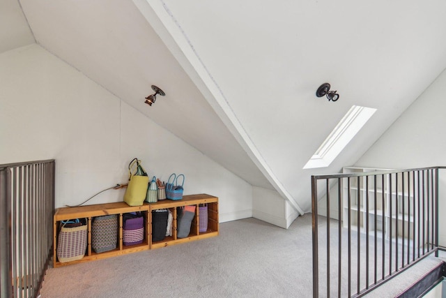 89 Huron St, Maywood, IL 60153 - additional living space with vaulted ceiling, a skylight, and carpet floors