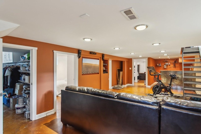 89 Huron St, Maywood, IL 60153 - living area featuring baseboards, recessed lighting, and finished concrete flooring