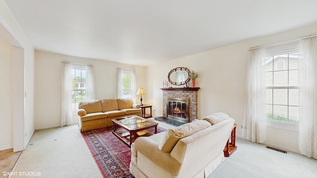 315 Carmelhead Ln, Schaumburg, IL 60193 - living room featuring light carpet, a brick fireplace, and baseboards