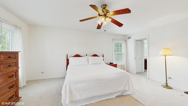 315 Carmelhead Ln, Schaumburg, IL 60193 - bedroom with light carpet, baseboards, and ceiling fan